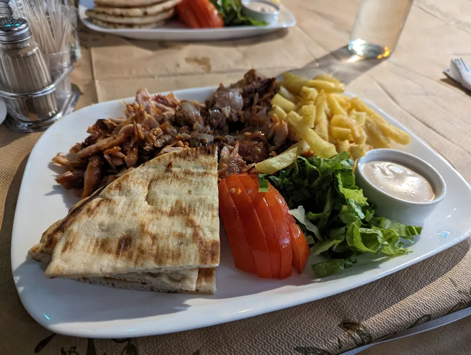 A picture of a chicken gyros (γύρος) platter